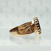 Almandine Garnet Claw Set on Engraved Cigar Band, side view
