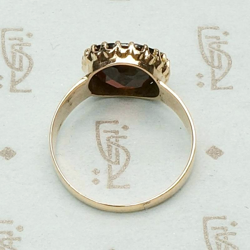 Almandine Garnet Claw Set on Engraved Cigar Band, top view