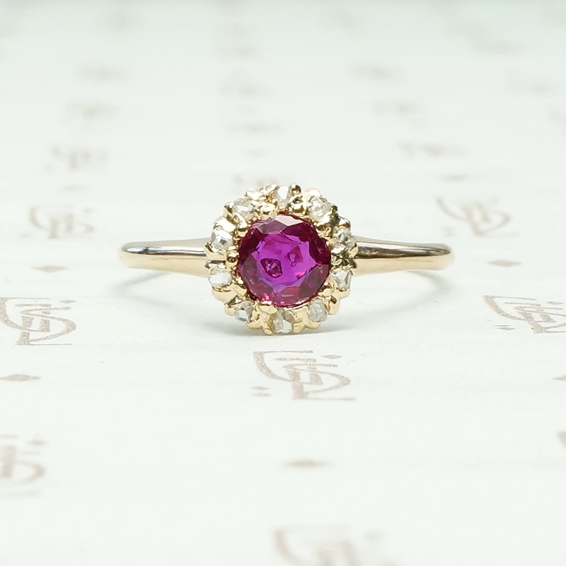 Natural Ruby in 14k yellow gold surrounded by 10 rose cut diamonds ring circa 1880