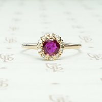 Natural Ruby in 14k yellow gold surrounded by 10 rose cut diamonds ring circa 1880
