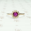 Natural Ruby in 14k yellow gold surrounded by 10 rose cut diamonds ring circa 1880