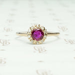 Natural Ruby in 14k yellow gold surrounded by 10 rose cut diamonds ring circa 1880