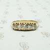 five old mine cut diamond band in melow old yellow gold with flame like ajouring