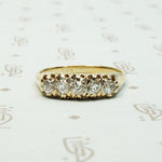 five old mine cut diamond band in melow old yellow gold with flame like ajouring