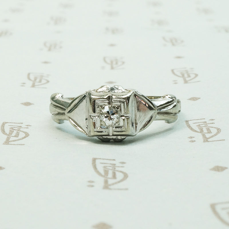 18k white gold deco engagement ring with little twinkly diamond dated 2-21-35