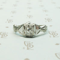 18k white gold deco engagement ring with little twinkly diamond dated 2-21-35