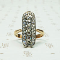 .55tcw long oval diamond panel ring platinum on 14k gold c1910