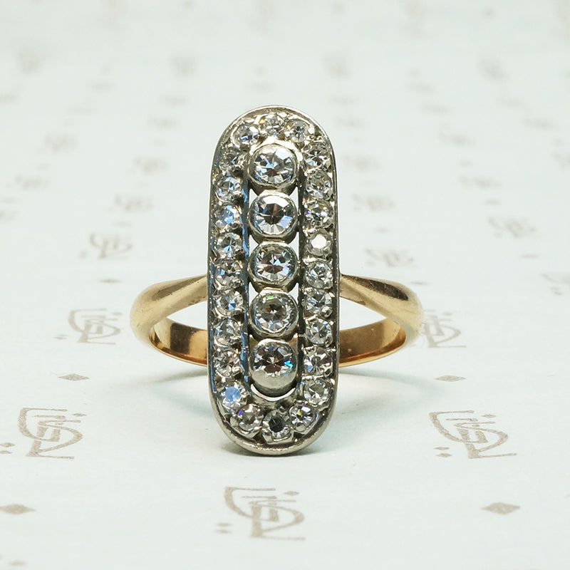 .55tcw long oval diamond panel ring platinum on 14k gold c1910
