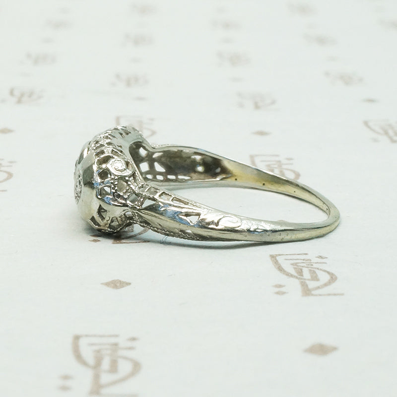 1920's White Gold Filigree Three Diamond Ring