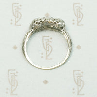 1920's White Gold Filigree Three Diamond Ring