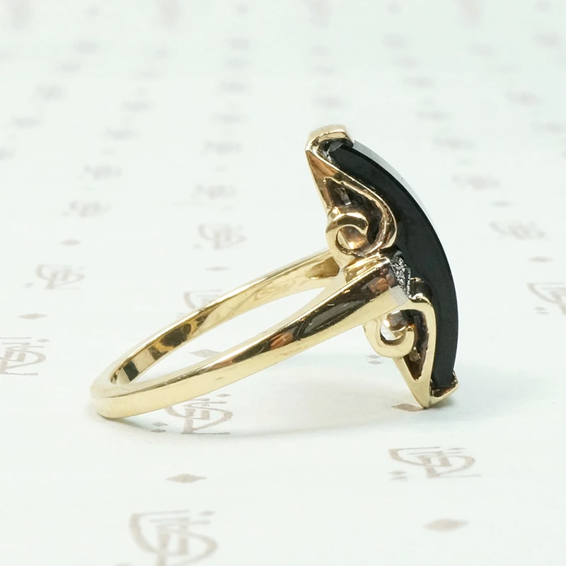 Unusual Two Tone Gold Onyx and Diamond Ring