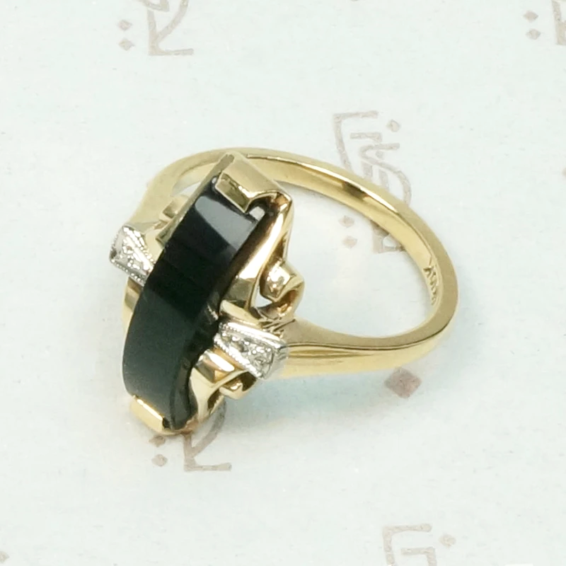 Unusual Two Tone Gold Onyx and Diamond Ring