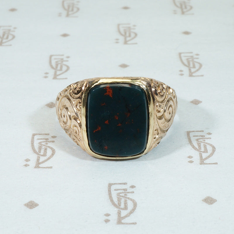 Bloodstone and Flourishes An 1850's Gold Ring