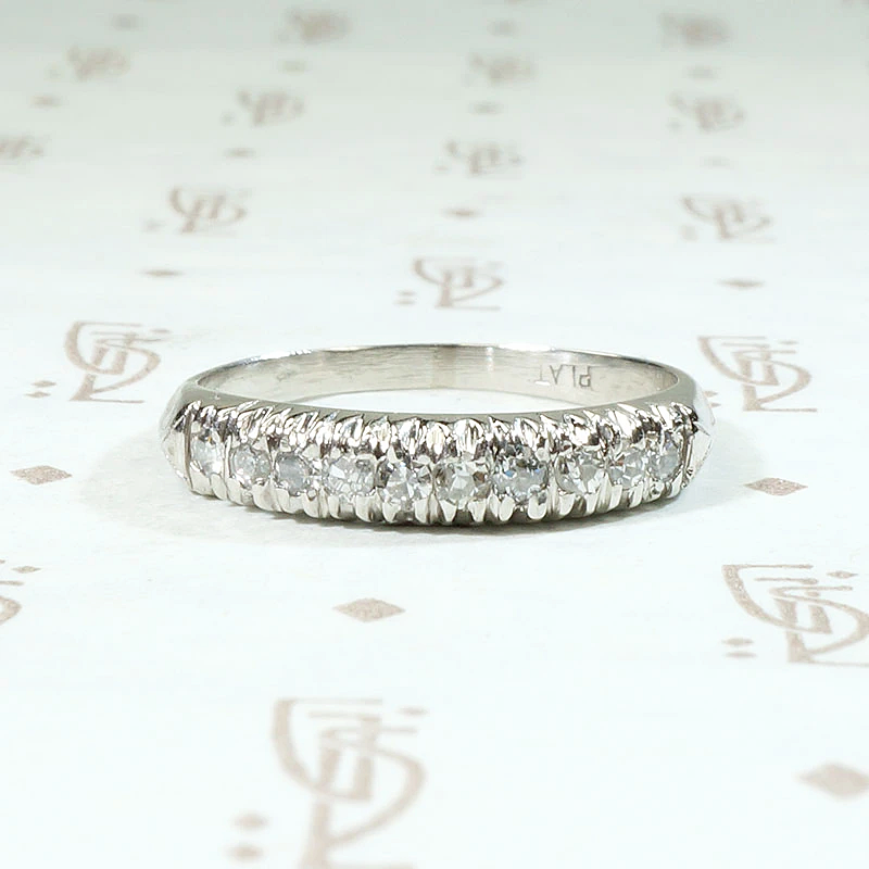 Interesting Ten Diamond & Platinum Wedding Band
