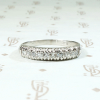 Interesting Ten Diamond & Platinum Wedding Band