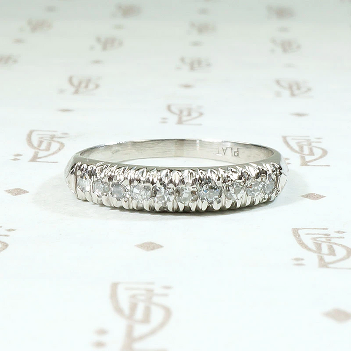 Interesting Ten Diamond & Platinum Wedding Band