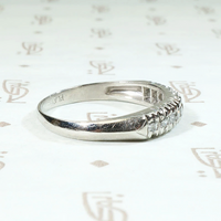 Interesting Ten Diamond & Platinum Wedding Band