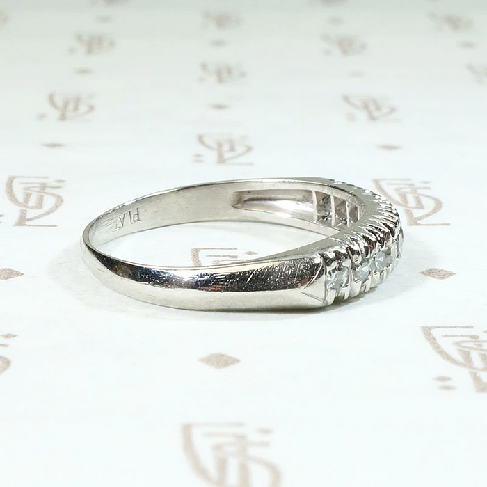 Interesting Ten Diamond & Platinum Wedding Band