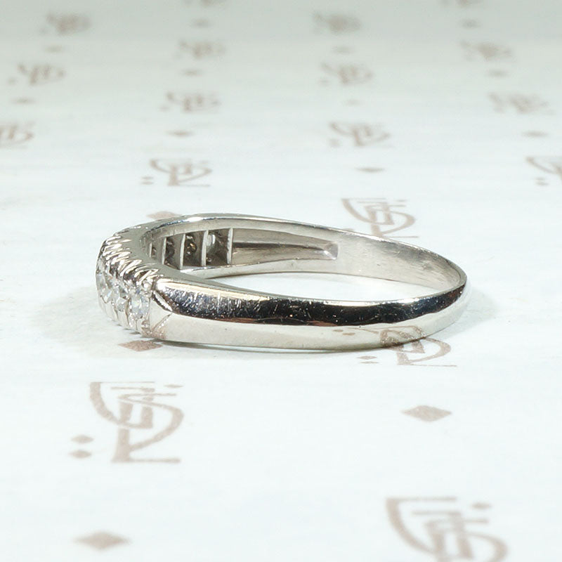 Interesting Ten Diamond & Platinum Wedding Band