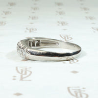 Interesting Ten Diamond & Platinum Wedding Band