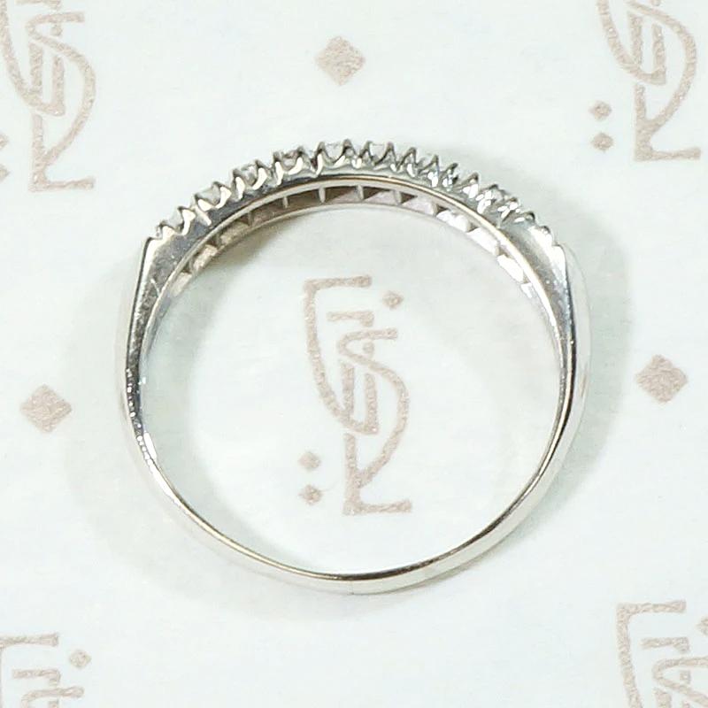 Interesting Ten Diamond & Platinum Wedding Band