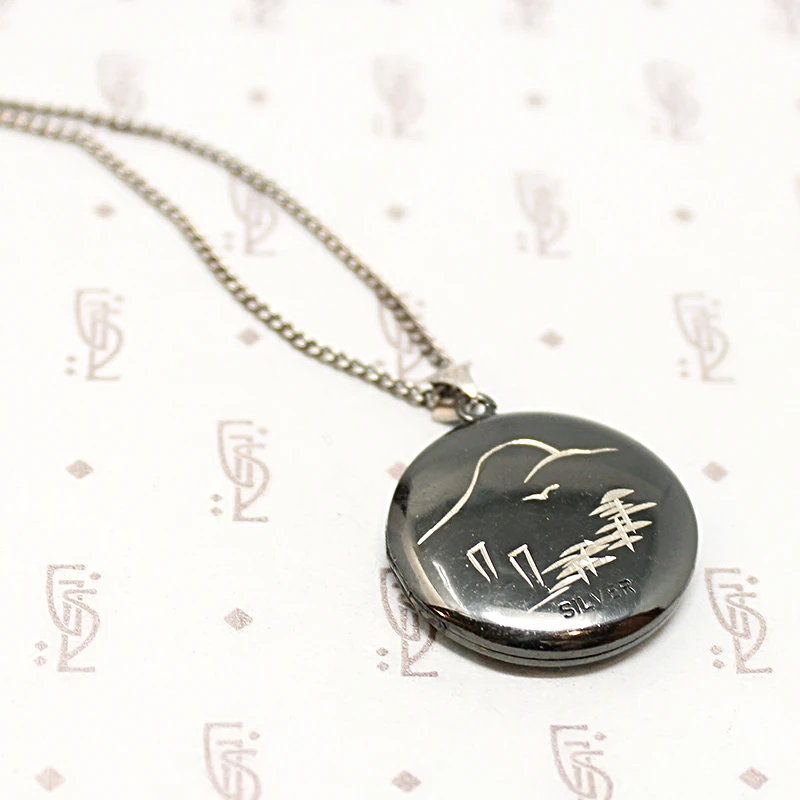 Niello Locket Engraved with View of Mount Fuji and Chureito Pagoda