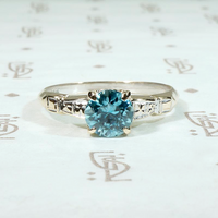 Natural Blue Zircon Solitaire with Hearts & Flowers