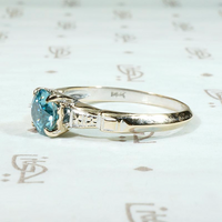 Natural Blue Zircon Solitaire with Hearts & Flowers