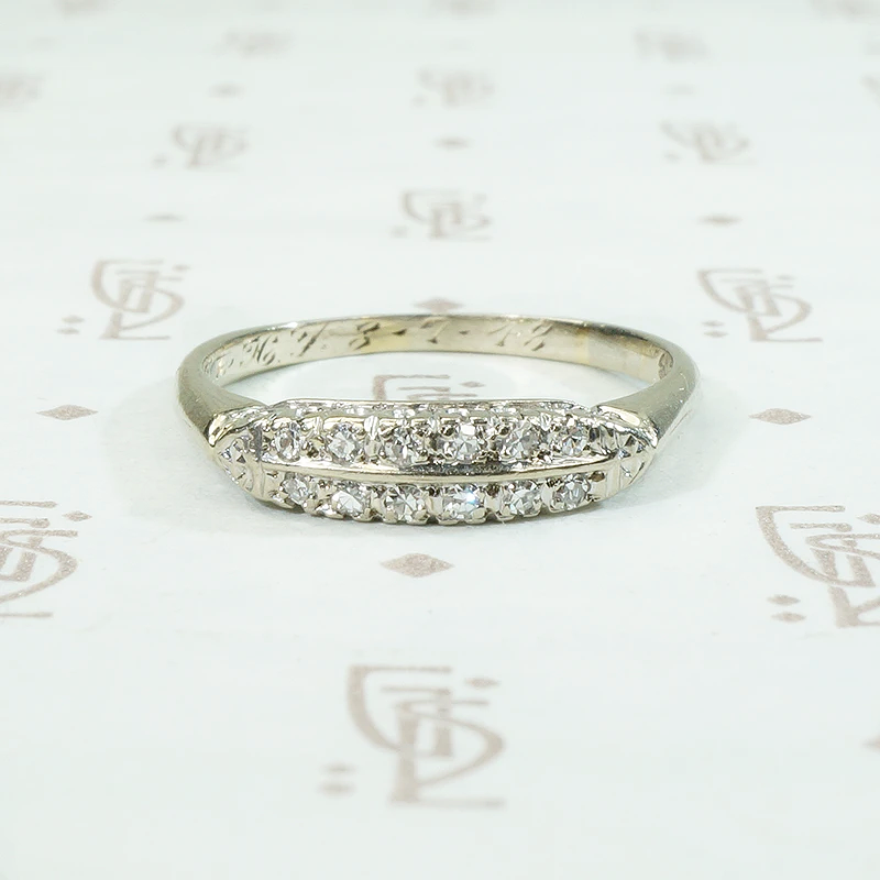 A delicate double row diamond band