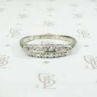 A delicate double row diamond band