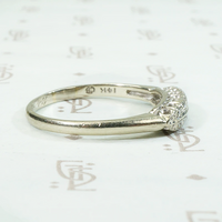 A delicate double row diamond band