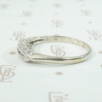 A delicate double row diamond band