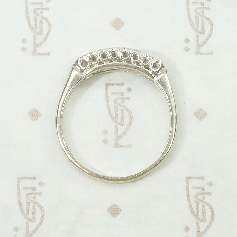 A delicate double row diamond band