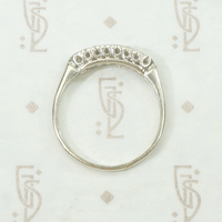 A delicate double row diamond band