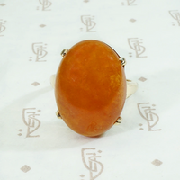 Smoldering Red Jade in Gold Ring