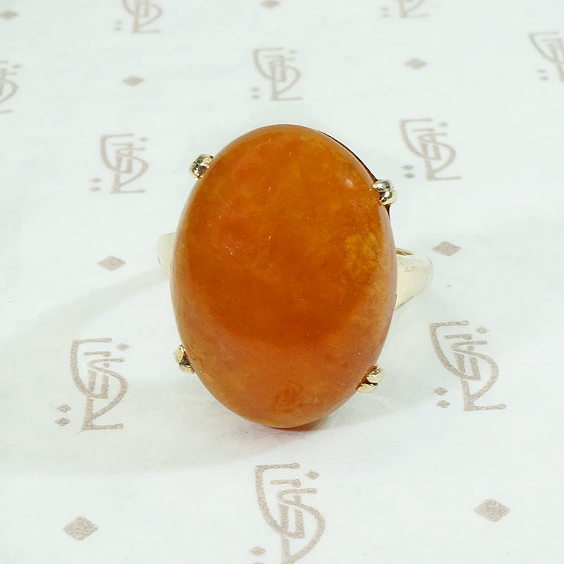 Smoldering Red Jade in Gold Ring