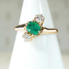 Jaunty Emerald Ring with Dazzling Accent Diamonds