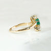 Jaunty Emerald Ring with Dazzling Accent Diamonds