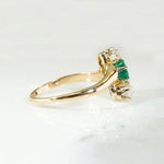 Jaunty Emerald Ring with Dazzling Accent Diamonds