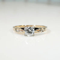 Classic Diamond Solitaire with Sculpted Gold Flowers