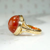 Spicy Carnelian Cabochon in Elegant Gold Ring