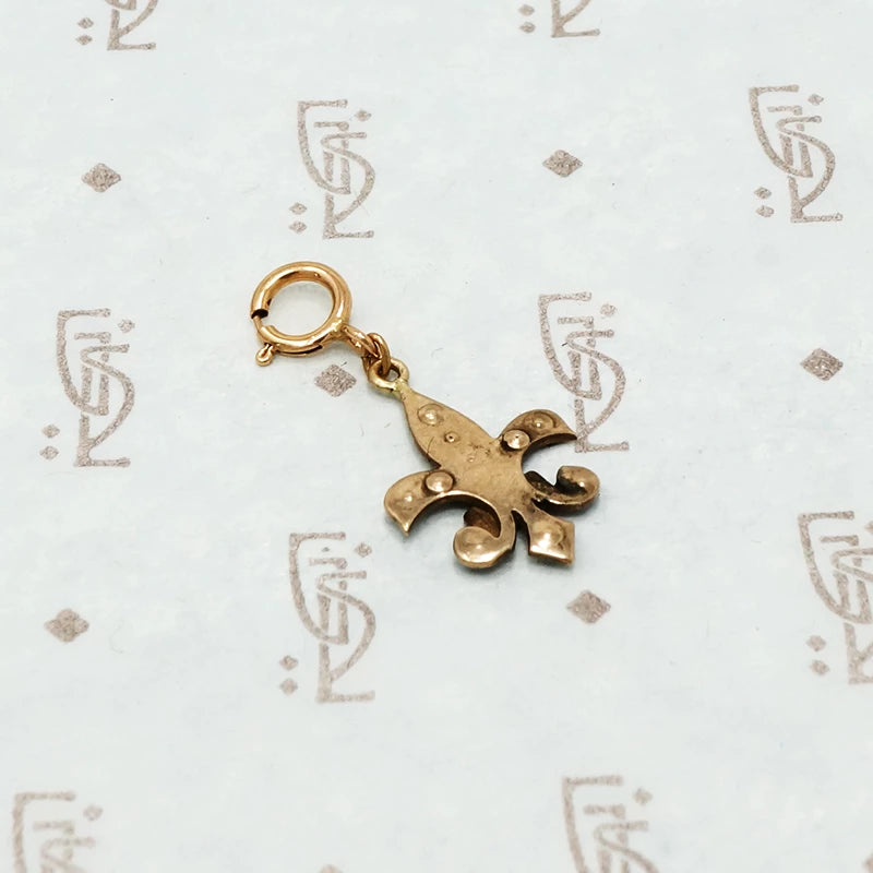 antique fleur de lis charm rose gold