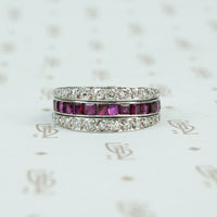 deco platinum diamond emerald and ruby flip eternity band