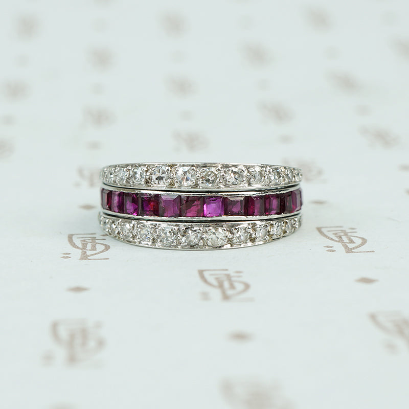 deco platinum diamond emerald and ruby flip eternity band