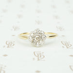 platinum on gold diamond flower ring