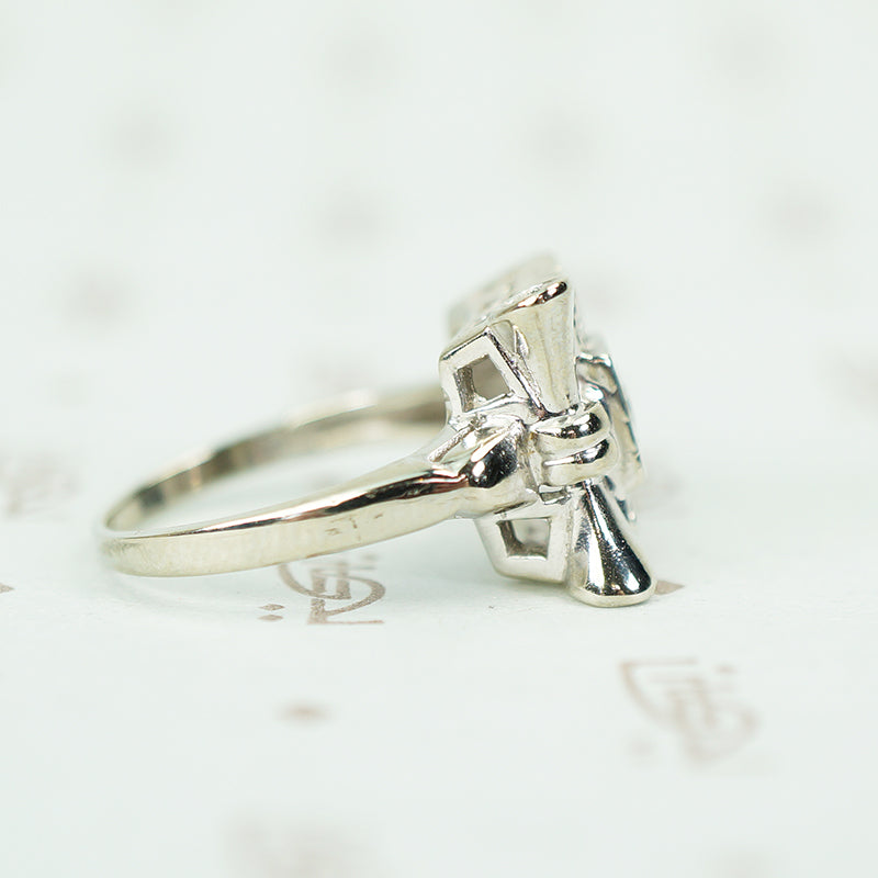 side view of 14k white gold flower diamond ring circa 1940