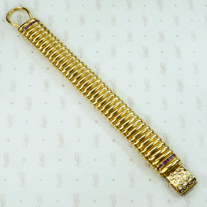 Magnificent 18k Gas Pipe Bracelet with Rubies and Diamonds