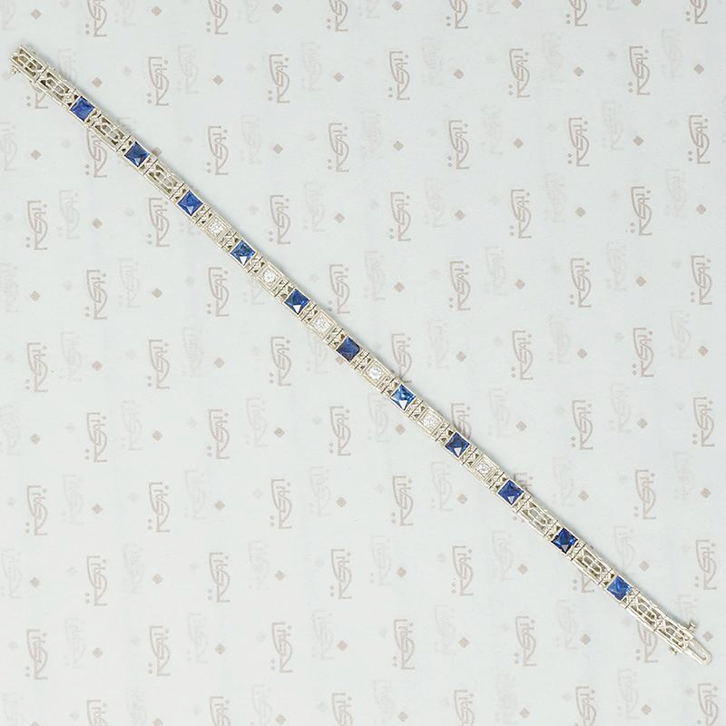 1920's white gold syn sapphire french cut and diamond band bracelet