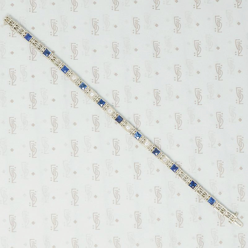 1920's white gold syn sapphire french cut and diamond band bracelet