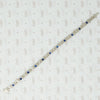 1920's white gold syn sapphire french cut and diamond line bracelet